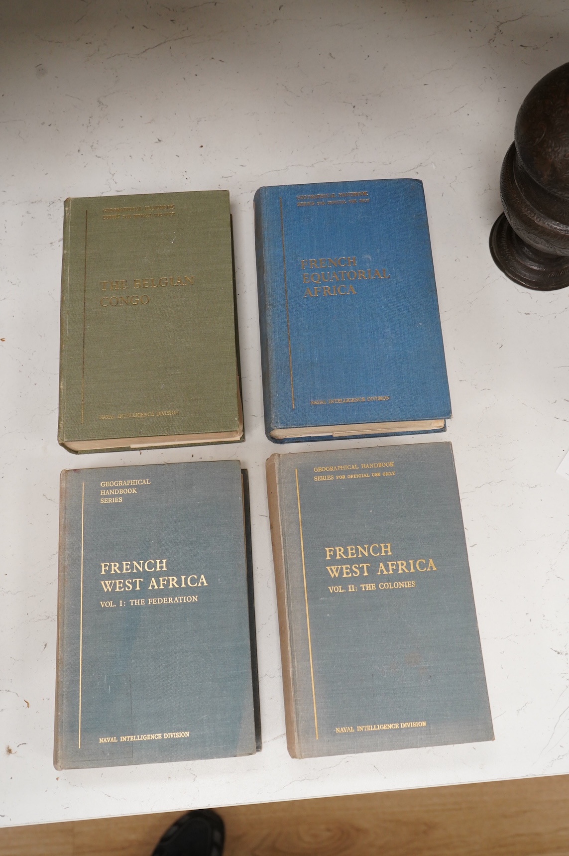 Naval Intelligence Division, Geographical Handbook Series - French Equatorial Africa & Cameroons (2 pocket maps), 1942; The Belgian Congo (2 pocket maps), 1944; French West Africa, 2 vols. (2 pocket maps), 1943-44 (4)